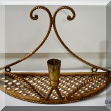 D16. Brass shelf.